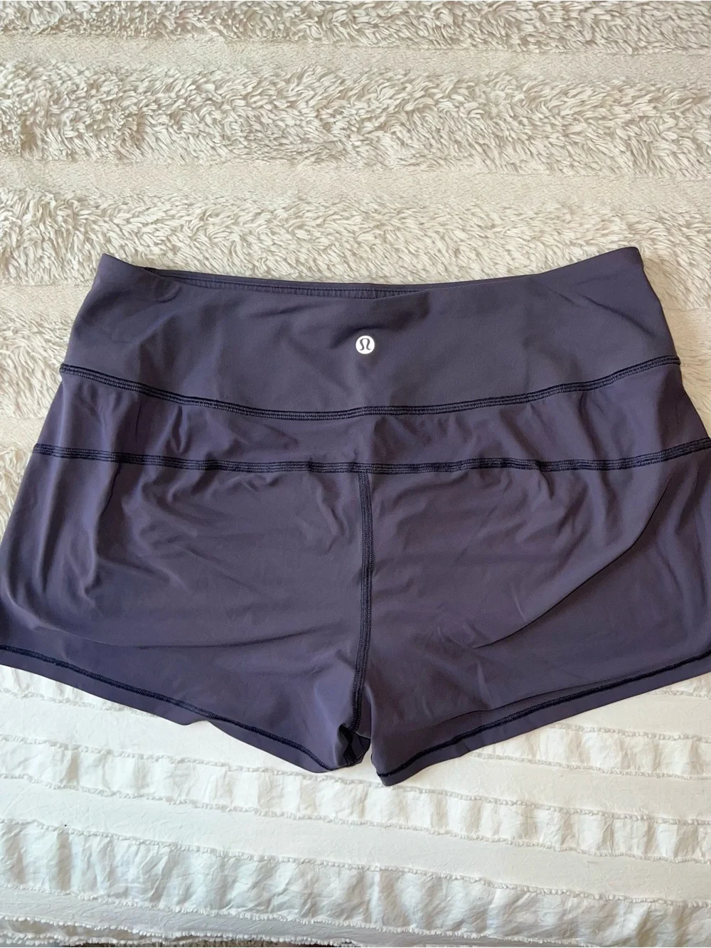 Like new Lululemon Women’s mid rise-Waist Purple Active Shorts